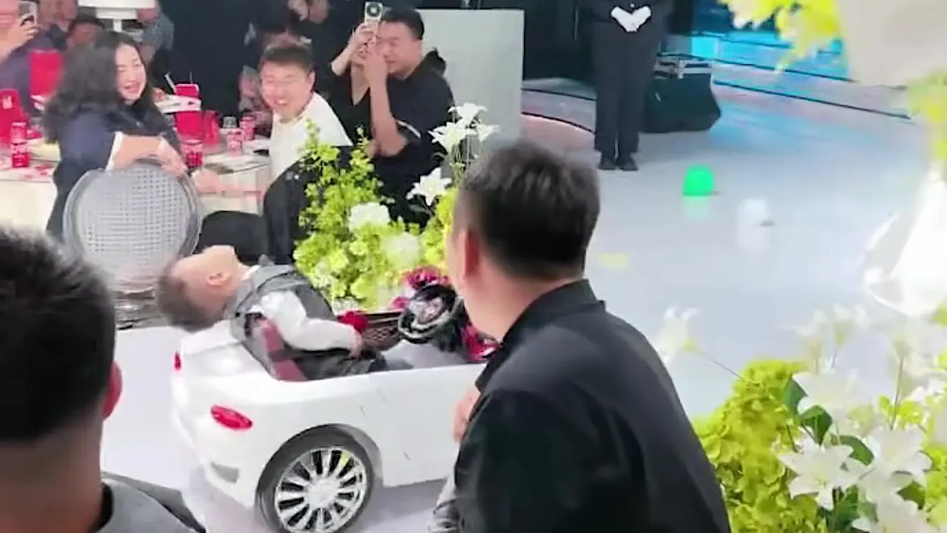 Little Ring Bearer Steals Wedding Show by Catching Zs in Mini Sports Car!