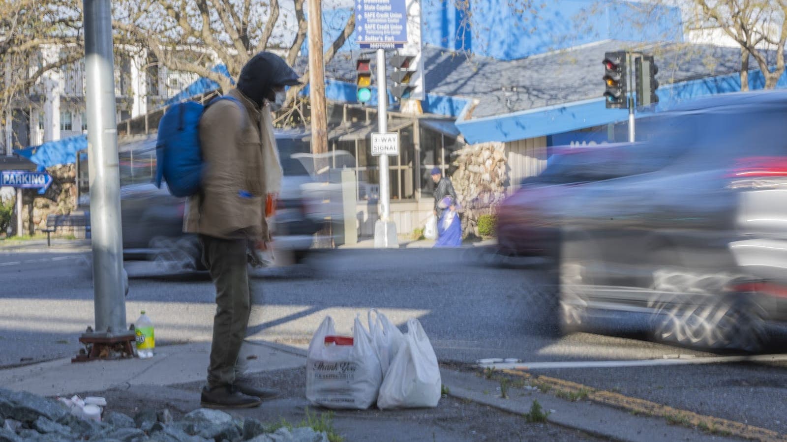 Behind the Signs: Unveiling the Stories of Sacramento's Unhoused