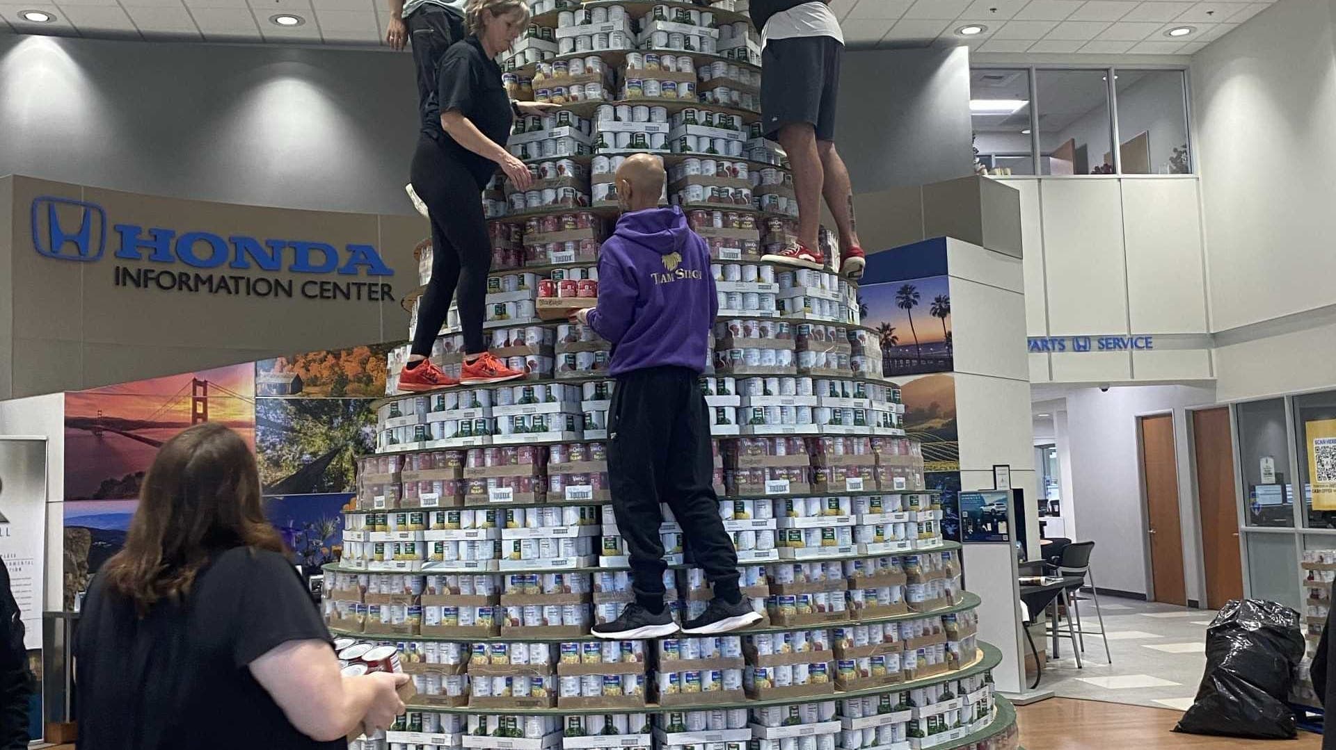 Building Generosity: Sacramento's 25-Foot Christmas CanTree Takes the Holidays to New Heights!