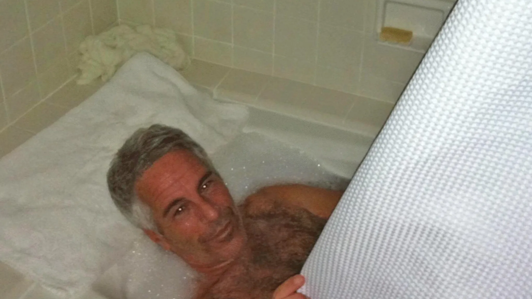 Jeffrey Epstein's Bubble Bath Photo: A Sudsy Scandal Unveiled