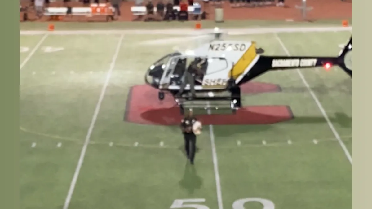 Sheriff's Helicopter Arrival Takes Homecoming to New Heights!