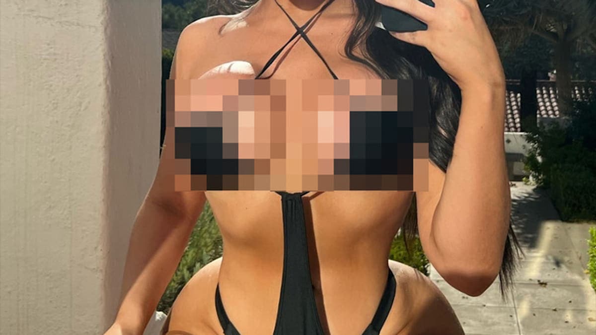 Who’s That Hollywood Star Rocking a Sizzling Black Cut-Out Swimsuit?