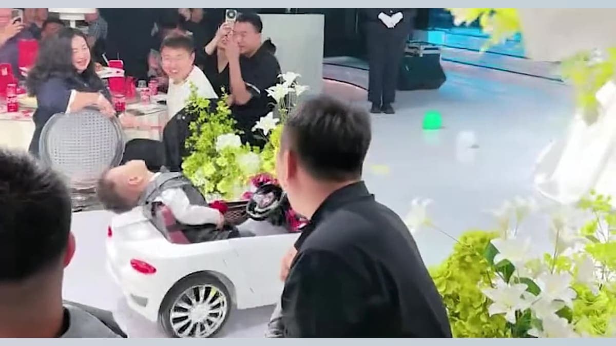 Little Ring Bearer Steals Wedding Show by Catching Zs in Mini Sports Car!