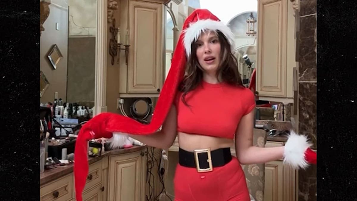 Millie Bobby Brown Dazzles in a Stylish Holiday Elf Look to Promote Her Fashion Line