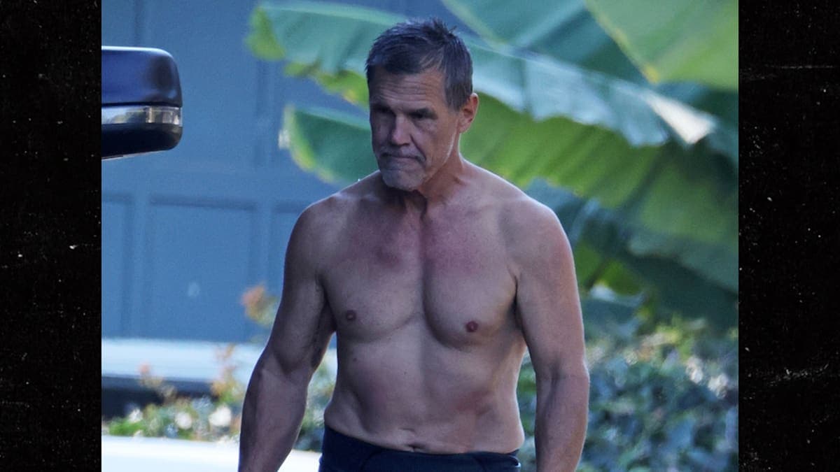 Josh Brolin's New Back Tattoo: A Lighthouse to Guide His Surfing Adventures!