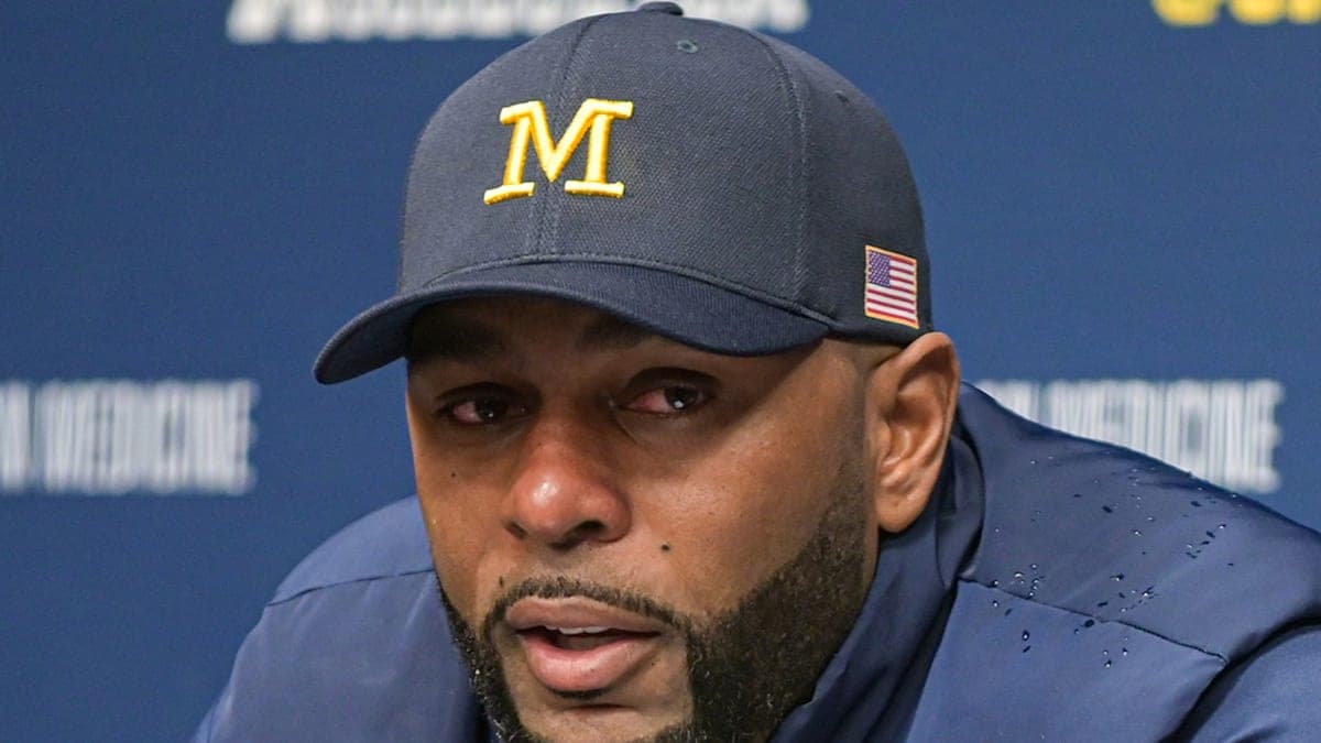 Michigan Coach's Exit Takes a Shocking Turn with Police Detention!